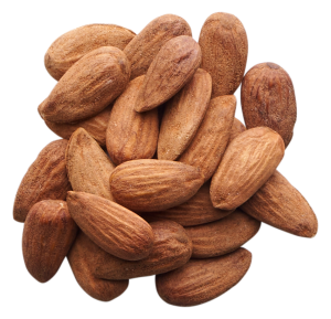 How are almonds harvested?